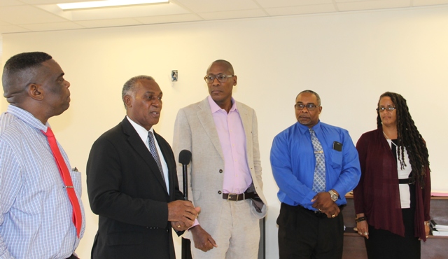 Hon. Vance Amory, Premier of Nevis (second from left) flanked by Antonio Maynard, Secretary General of the St. Kitts and Nevis National Commission for United Nations Education, Scientific Cultural Organization (extreme left), Dr. Keith Nurse, of the Sir Arthur Lewis Institute of Social and Economic Studies in Barbados (right), Jerome Rawlins, Chief Executive Officer of the Nevis Cultural Development Foundation (second from right) and Marlene Phillips, Research and Documentation Specialist at the St. Kitts Department of Culture (extreme right) at the end of a meeting at his Pinney’s Estate office on May 31, 2017