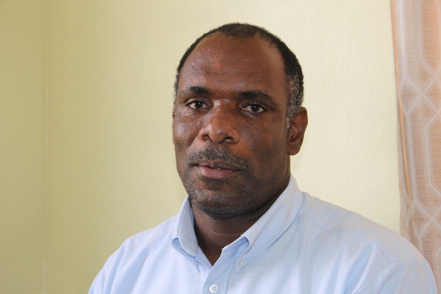 Colin Dore, Permanent Secretary in the Ministry of Finance in the Nevis Island Administration