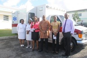 (l-r) Mrs. Jessica Scarborough, Assistant Matron at the Alexandra Hospital; Aldris Pemberton-Dias, Matron at the Alexandra Hospital; Ms. Marlene Jeffers, Acting Hospital Administrator; Hon. Mark Brantley, Minister of Foreign Affairs, Premier of Nevis and Minister of Health; Mrs. Shelisa Martin-Clarke, Acting Permanent Secretary and Health Planner in the Ministry of Health and; Dr. Cardell Rawlins, Medical Chief of Staff at the Alexandra Hospital at the handing over ceremony of an ambulance from His Excellency Sir Kutayba Alghanim, Counsel General to St. Kitts and Nevis in New York