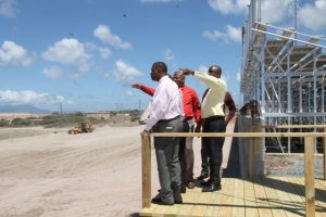 Members of the Nevis Island Cabinet led by Acting Premier Hon. Alexis Jeffers and Mr. Kevin Barrett, Permanent Secretary in the Ministry of Education looking at construction works of a parking lot while checking on progress at the Mondo Track project at Long Point on March 20, 2018