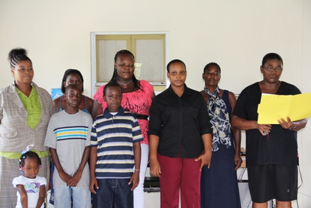 Back row (L-R) Department of Social Services Single Parent Support Group members Ms. Vanessa Taveras, Ms. Shana Phillip’s, Ms. Predencia Huggins and Ms. Ermine Whyte. Front row (L-R) Masters Austin Bart and Keijarie Huggins, Group Members Ms. Robehna Wilkinson and Department of Social Services Coordinator for the Single Parent Support Group Mrs. Grace Manners