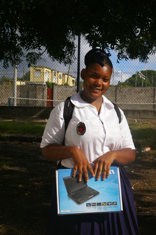 Young lady on receipt of her laptop