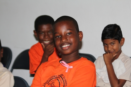 Some students from the Charlestown Primary contingent among those at the Nevis Cultural Centre after taking part in the World AIDS Day march on Nevis