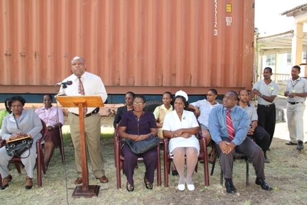 Minister of Health and Deputy Premier in the Nevis Island Administration Hon. Hensley Daniel delivering remarks at the handing over ceremony with other Hospital staff and invited guests present. Special Advisor to Health on Nevis Mrs Patricia Hanley is seated at his immediate right with Head Nurse Matron Aldris Dias and Medical Chief of Staff of the Alexandra Hospital Dr John Essien. Mrs. Myrthlyn Parry a Director at the Development Foundation Inc is seated at his immediate right