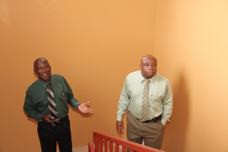 (L-R) Jessups Villager and Cabinet Secretary Mr. Ashley Farrell and Minister for Social Development in the Nevis Island Administration Hon. Hensley Daniel touring inside the Jessups Community Centre to be officially opened by month end
