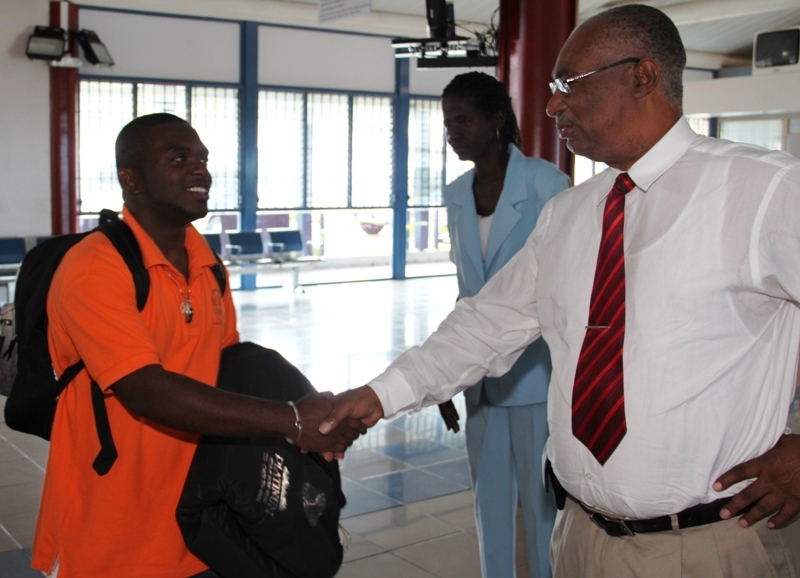 Mr. Jason Le Blanc shaking hands with Premier of Nevis, Hon. Joseph Parry