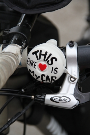 Ms. Kristina Storey’s personalised button on her bike she will ride from Nevis on April 1st, 2012 for 30,000 kilometres for 300 days to 26 countries and six continents before returning to Nevis in February 2013