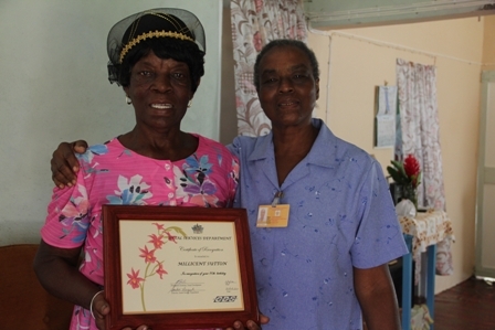 The Department of Social Services Care Giver for Cotton Ground and environs Mrs. Jeanette Herbert with Aunty Baby