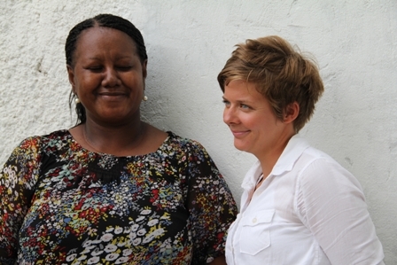 (L-R) Director of Social Services Ms. Sandra Maynard former Peace Corps Volunteer and Nevis Island Administration (NIA) employee Ms. Kristina Storey reunited; share a tender moment