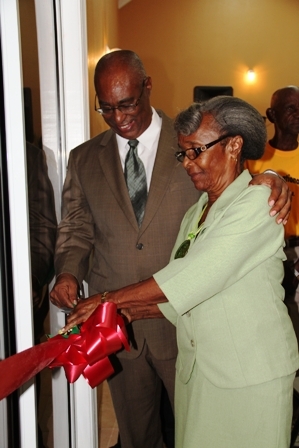 Premier of Nevis and Area Representative Hon. Joseph Parry and Jessups Villager Ms. Anita Byron cut the ribbon to signal the official opening of the Jessups Community Centre