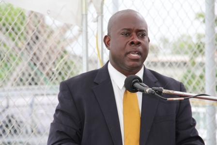 Minister of Agriculture and Fisheries in the Nevis Island Administration Hon. Robelto Hector delivering remarks at the Grant Signing and Notes Exchange Ceremony at the Charlestown waterfront in Gallows Bay on April 27, 2012