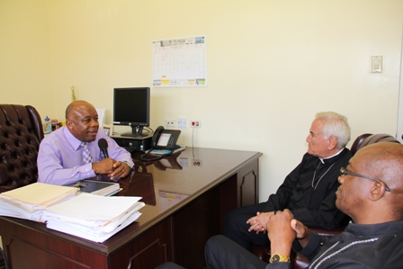 Acting Premier in the Nevis Island Administration Hon. Hensley and Vatican officials (l-r) Bishop of St. Johns/Basseterre the Most Reverend Kenneth Richards and new Vatican Ambassador to St. Kitts and Nevis the Most Reverend Nicola Girasol during a courtesy call at his Charlestown Office