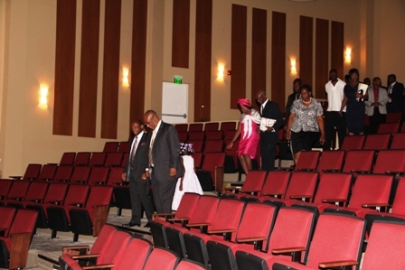 Prime Minister of St. Kitts and Nevis the Hon. Denzil Douglas and Premier of Nevis Hon. Joseph Parry followed by Mr. and Mrs. Sutton and family on a tour of the Michael Herald Sutton Auditorium