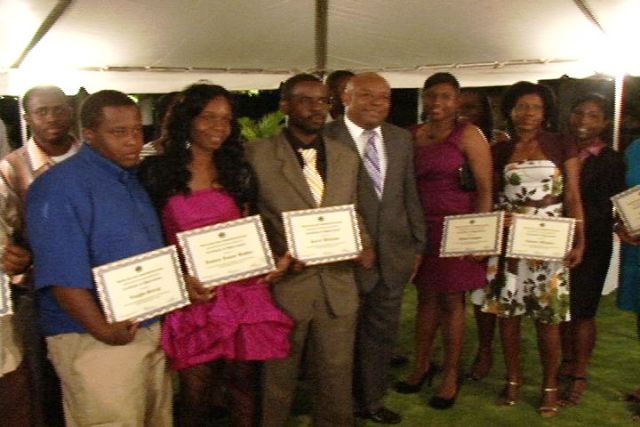 A section of the awardees at the Department of Human Resource’s Award Ceremony for Young Civil Servants held at the Botanic Gardens, with (fourth from right) Deputy Premier and Minister responsible for Youth in the Nevis Island Administration Hon. Hensley Daniel