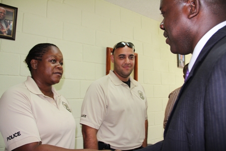 Nevis Island Administration Minister Hon. Robelto Hector greets the visiting USVI Police Officers