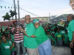 Premier of Nevis, Hon. Joseph Parry on the morning of the Election win being congratulated by fellow St. Georges Candidate, Mrs.Patsy Hanley