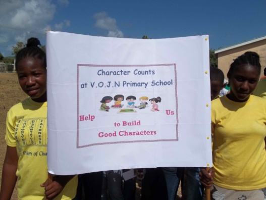 Children holding sign for Character Counts Walk- a-thon