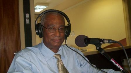 Premier of Nevis, Hon. Joseph Parry on the radio (file photo)