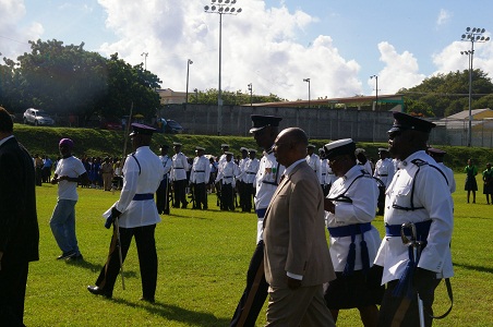 Premier of Nevis, Hon. Joseph Parry inspecting the uniformed bodies