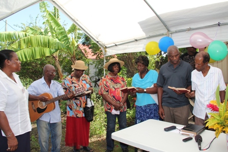 Mr. Melford Ward (extreme right) son of birthday celebrant Mrs. Selina Ward and other well wishers singing in celebration of his mother’s 101st birthday