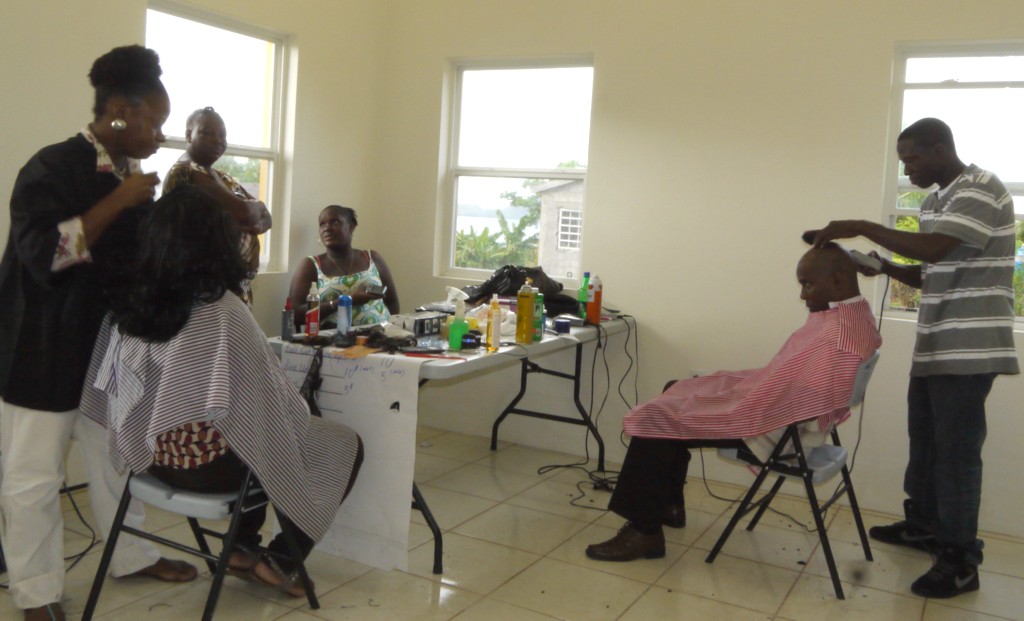  Fresh Look Beauty Salon and Barber'n staffers were kept busy during the selling period with Permanent Secretary in the Ministry of Youth Mr. Alsted Pemberton getting his hair cut by co proprietor Mr. Analdo Browne