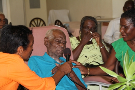 (L-R) Daughters Mrs. Helen Webbe and Mrs. Esther Sutton and their father Mr. Arnold Chiverton (middle) a 98 year old resident of the Flamboyant Nursing Home
