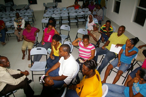 Attorney General of St.Kitts - Nevis, the Hon. Patrice Nisbett with youths of St. James Parish