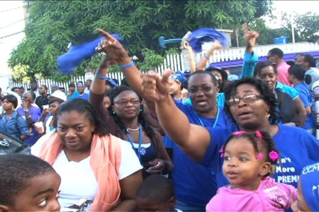 Jubilant Concerned Citizens Movement supporters gathered outside the Party headquarters in Charlestown after the announcement of their party’s win at the polls