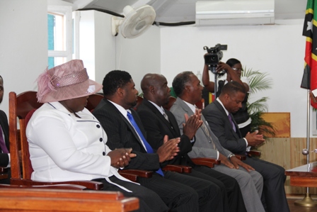 Members of the Nevis Island Administration (l-r) Hon. Hazel Brandy-Williams, Hon. Uthant Liburd, Hon Alexis Jeffers, Premier of Nevis Hon. Vance Amory and Deputy Premier of Nevis hon. Mark Brantley listen to Deputy Governor General His Honour Eustace John delivering the Throne Speech at the first sitting of the Nevis Island Assembly at Hamilton House in Charlestown on March 26, 2013