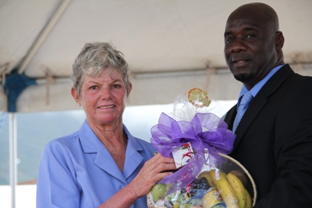 Another token of appreciation given to Patron of the 2013 Agriculture Open Day and 30-year Livestock Farmer Mrs. Sandra David by Minister of Agriculture Hon. Alexis Jeffers