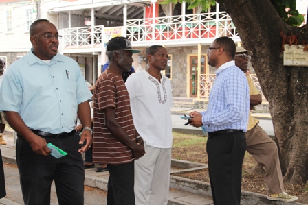 Deputy Premier of Nevis and Senior Minister of Social Development Hon. Mark Brantley interacting with patrons at a health fair hosted by the Ministry of Social Development through its Gender Affairs Unit to mark International Men’s Day at the Memorial Square on November 19, 2013