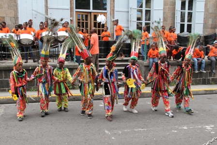 Young Masquerades and a steel pan contingent from the Charlestown Primary School perform at a health fair hosted by the Ministry of Social Development through its Gender Affairs Unit to mark International Men’s Day at the Memorial Square on November 19, 2013