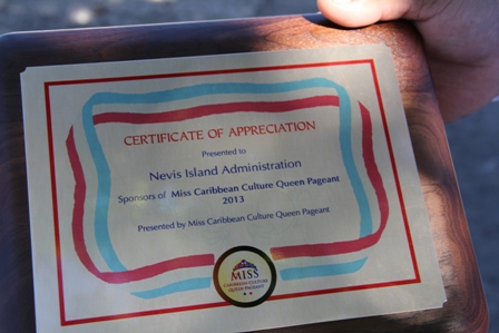 The token of appreciation presented to Deputy Premier of Nevis and Minister of Culture Hon. Mark Brantley, on behalf of the Nevis Island Administration for its support during the staging of the 2013 edition of the Miss Caribbean Culture Queen pageant on Nevis
