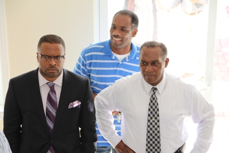 Premier of Nevis Hon. Vance Amory (right), Deputy Premier Hon. Mark Brantley (l) and Treasurer in the Nevis Island Administration Colin Dore (back) during a tour of the Nevis Corporative Credit Union’s Ingle Blackette Building Business Complex in Charlestown along with other members of the NIA Cabinet