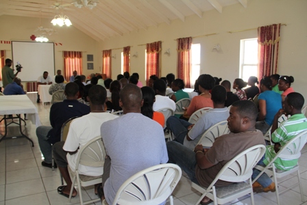 Combined staff of the Nevis Treasury, Inland Revenue and Valued Added Tax Departments meeting with Premier of Nevis and Minister of Finance Hon. Vance Amory, Permanent Secretary in the Ministry of Finance Mr. Laurie Lawrence and Treasurer Mr. Colin Dore at the red Cross conference room discussing the way forward after a fire gutted their offices early morning on January 17, 2014