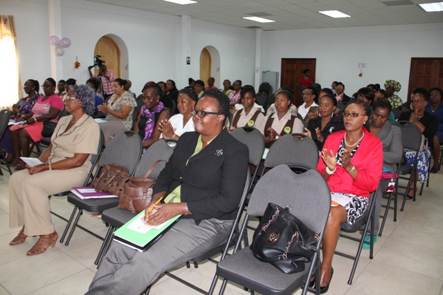 A section of persons at the opening ceremony for a Symposium tailored for women on Nevis on March 05, 2014 hosted by Department of Social Development Gender Affairs Division 