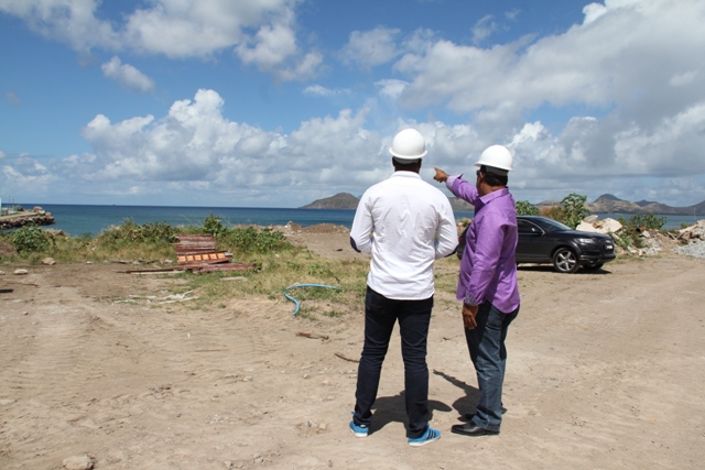 Managing Director of the Residence at Tamarind Cove and Marina Project and local investor Greg Hardtman points out, to Deputy Premier of Nevis and Minister of Tourism Hon. Mark Brantley, the area in which construction work is scheduled to begin for Marina Project