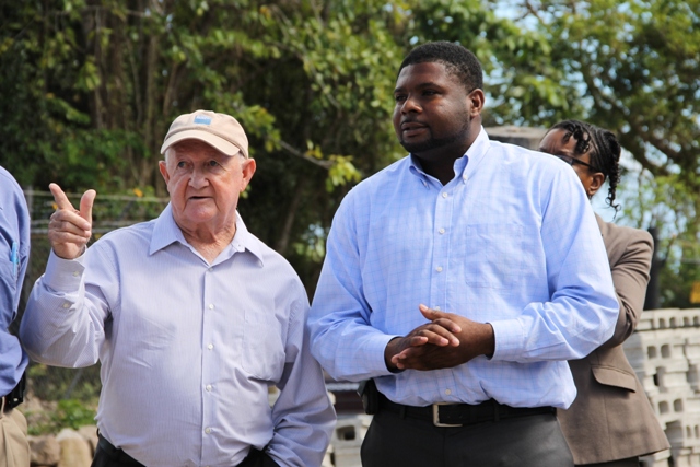 Junior Minister in the Ministry of Communications and Works, Physical Planning and Public Utilities on Nevis Hon. Troy Liburd (l) with Project Coordinator Brian Kennedy, during a tour by Cabinet members of the Water Enhancement Project on April 16, 2014