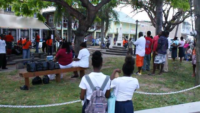 Part of an appreciative audience listen to the Rehabilitation Group Impression (RGI), a two-year-old band from Her Majesty’s Prison in Basseterre performing live as part of the Ministry of Social Development’s Youth Month 2014 activities