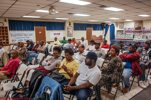 A section of Nevisians and other nationals of St. Kitts and Nevis listen to Premier of Nevis Hon. Vance Amory during a meeting at the St. Luke’s Episcopal Church in the Bronx, New York on May 23, 2014