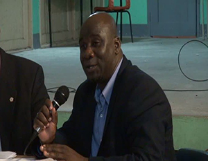 Minister of Housing and Lands on Nevis Hon. Alexis Jeffers at the Nevis Island Administration’s town hall meeting at the Gingerland Secondary School auditorium on August 29, 2014