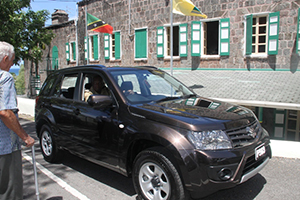 Assistant Commissioner of Police Robert Liburd in the new Suzuki Grand Vitara, donated to the people of Nevis by retired businessman Charles Brisbane on September 18, 2014