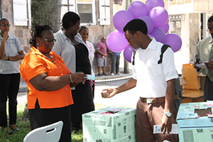 Director of the Department of Statistics and Economic Planning Doriel-Tross Phillip with a student of the Nevis Sixth Form College, at the Careers in Statistics Awareness and Education Fair at the Memorial Square in Charlestown on October 15, 2014