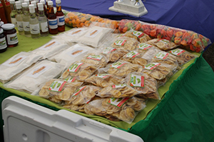 Dried cassava, plantain chips, coconut oil and guava jam made by an agro processor on Nevis