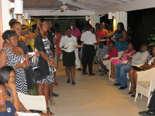 Some of the outstanding teens at a reception hosted by the Nevis Island Administration in their honour with other invited guests at the Mount Nevis Hotel on November 22, 2014