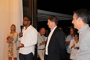 (L-R) Deputy Premier of Nevis and Minister of Tourism Hon. Mark Brantley, Managing Partner of St. Kitts/Nevis Residents and Citizenship from Henley & Partners Caribbean Ltd. Christopher Willis and Vice President of the FSRE Nevis David Chekemian at a cocktail party at Villa 2001 on November 20, 2014, to mark the official opening of Villas on Pinney’s Beach