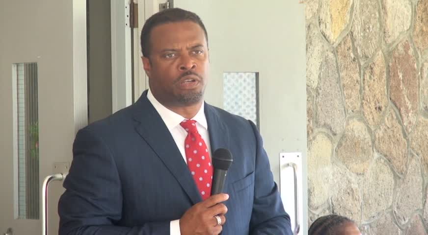 Deputy Premier of Nevis and Minister of Health Hon. Mark Brantley delivering remarks on October 27, 2014 at the Flamboyant Nursing Home