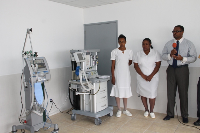 Deputy Premier of Nevis and Minister of Health Hon. Mark Brantley with Nurse Manager Jessica Scarborough (middle) and Critical Care Nurse Sylvannie Andre at the commissioning ceremony of a new ventilator machine (left) and an anaesthesia machine at the Alexandra Hospital on November 26, 2014