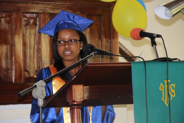 Valedictorian of the 2014 Graduating Class of the Gingerland Secondary School Cordiesere Walters delivers her farewell speech during the graduation ceremony at the Gingerland Methodist Church on November 27, 2014