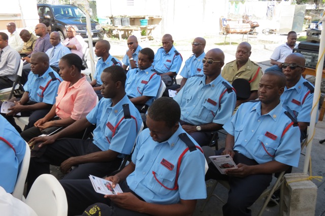 Officers of the St. Kitts-Nevis Fire and Rescue Services Nevis Division at the handing over ceremony of a new fire tender funded by the European Development Fund and the federal Government on December 17, 2014